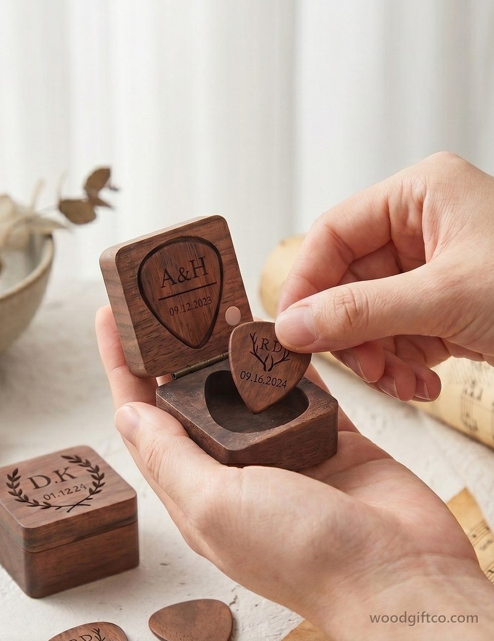 A custom-made walnut box held in the hand